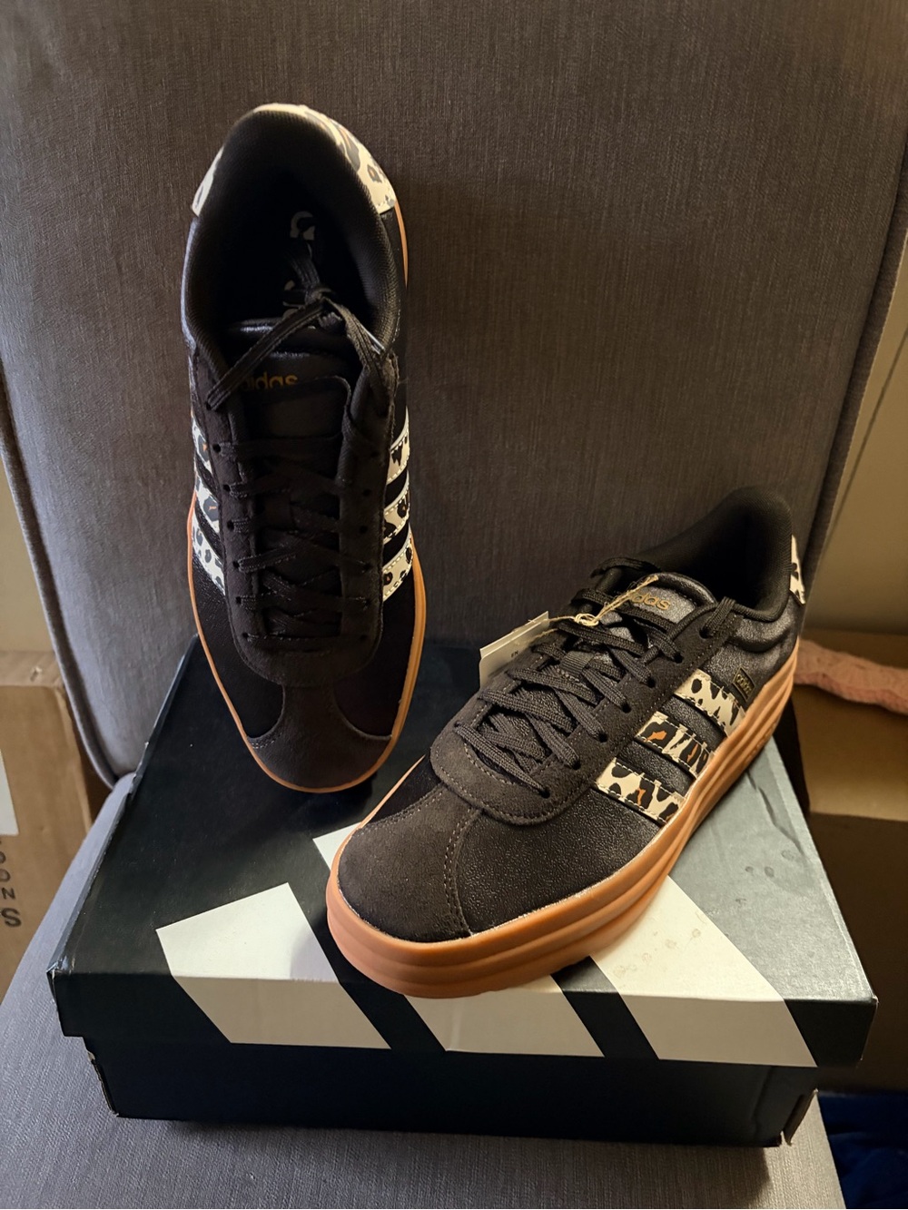 Women’s Black Low-Top Sneakers with Leopard Accent and Gum Sole